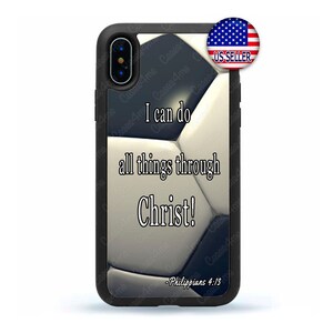 May include: Black phone case with a white and black soccer ball design. The case features the text "I can do all things through Christ! - Philippians 4:13".