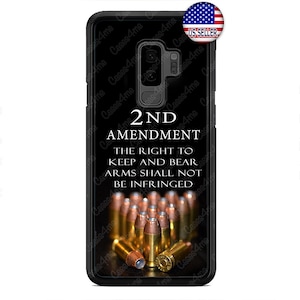 May include: A black phone case with a clear back. The back of the case features a design of bullets and the text "2nd Amendment The right to keep and bear arms shall not be infringed".