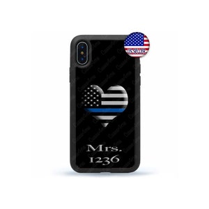 May include: Black phone case featuring a thin blue line heart design and the text "Mrs. 1236". The heart incorporates the American flag and a thin blue line.