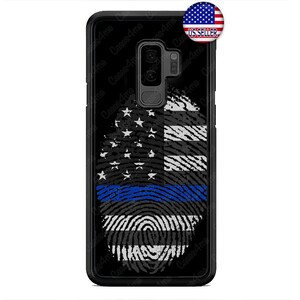 May include: Black phone case with a fingerprint design featuring the American flag and a blue line. The case is for a phone with a dual camera lens.