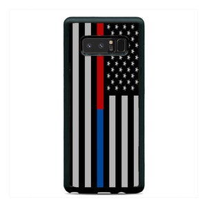 May include: Black phone case with a thin red, white, and blue stripe design. The design resembles the American flag with a thin red stripe, a thin blue stripe, and white stripes.