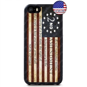 May include: A black iPhone case with a distressed American flag design. The case features the text "2nd Amendment" and the words "A well regulated militia, being necessary to the security of a free state, the right of the people to keep and bear arms shall not be infringed."