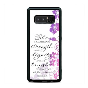 May include: A white phone case with a black border and a floral design. The text "She is clothed in strength and dignity and she laughs without fear of the future Proverbs 31:25" is printed on the case.
