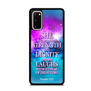May include: A phone case with a galaxy-like background in shades of purple and blue. The text "SHE IS CLOTHED IN STRENGTH AND DIGNITY, AND SHE LAUGHS WITHOUT FEAR OF THE FUTURE. Proverbs 31:25" is printed in pink and purple.