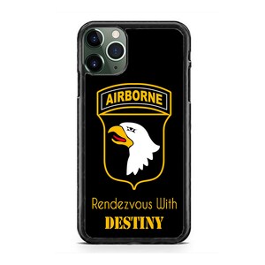 May include: Black iPhone case with a yellow and white 101st Airborne Division patch and the text "Rendezvous With DESTINY".