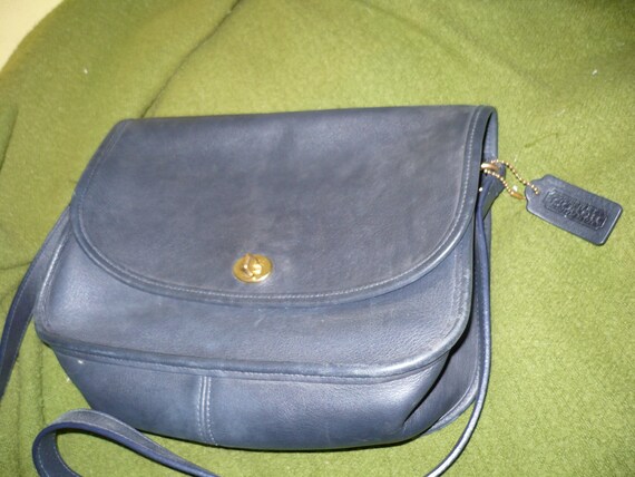 dark blue coach purse