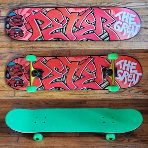 "Peter" custom painted graffiti skateboard (full build) painted and built by Orikal Uno of Graff Roots Media - custom griptape and wheels to match customer's request.
