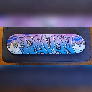 "Devon" custom painted graffiti skateboard painted by Orikal Uno of Graff Roots Media