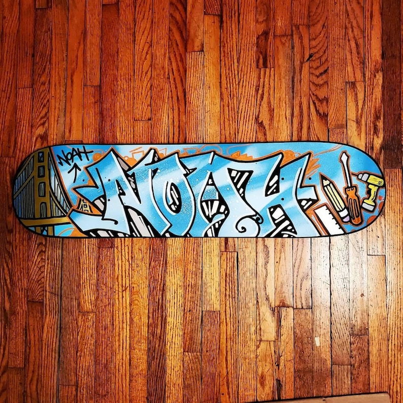 "Noah" custom painted graffiti skateboard painted by Orikal Uno of Graff Roots Media