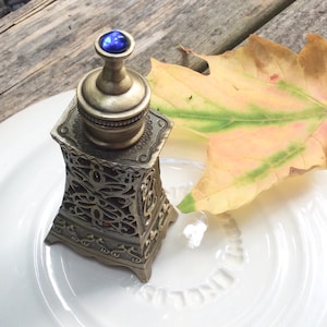 Vintage Kasturi Arabian filagree perfume oil bottle, Arabic Musk oil Perfume vial, caged encased Perfume oil, Arabian musk scented oils vial