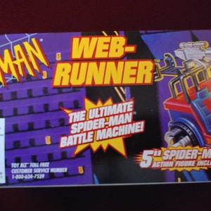 May include: A red and blue toy vehicle with a web-shooter and a Spider-Man action figure. The box reads "Web-Runner" and "The Ultimate Spider-Man Battle Machine!"