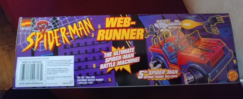 May include: A red and blue toy vehicle with a web-shooter and a Spider-Man action figure. The box reads "Web-Runner" and "The Ultimate Spider-Man Battle Machine!"