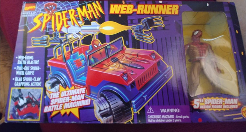 May include: A red and blue toy vehicle with a Spider-Man figure in the driver's seat. The vehicle has a web-firing battle blaster, pull-out spider-wheel grips, and rear spider-claw grappling action. The box also includes a 5-inch Spider-Man action figure. The text on the box reads "SPIDER-MAN WEB-RUNNER" and "THE ULTIMATE SPIDER-MAN BATTLE MACHINE!"