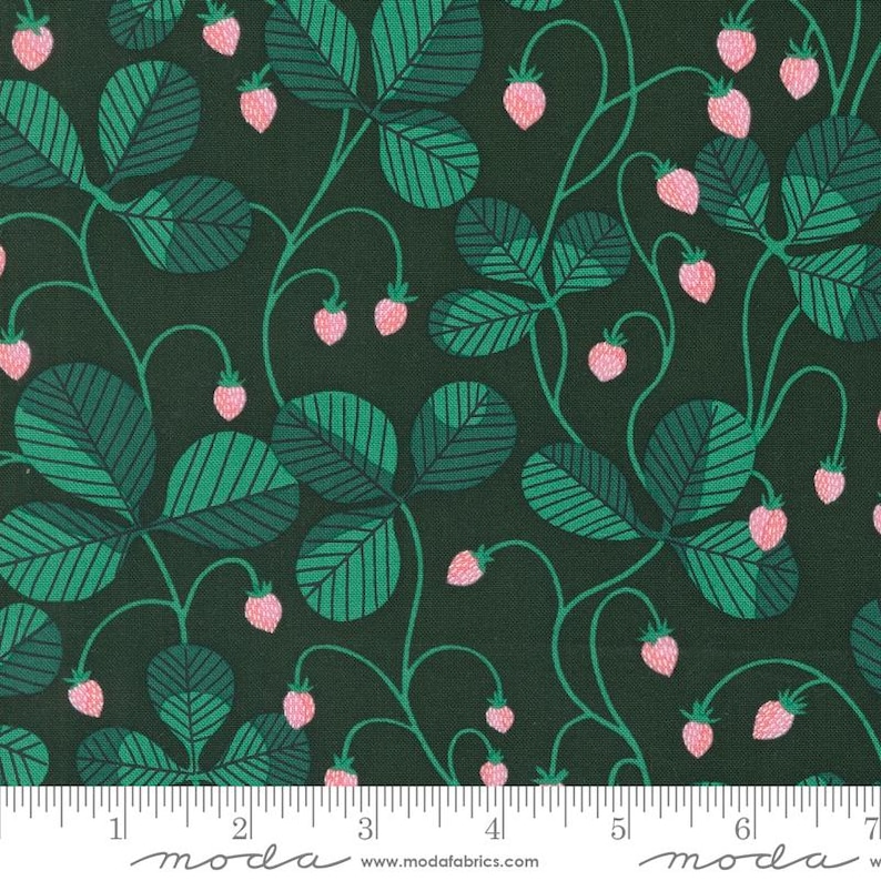 May include: Dark green fabric with a repeating pattern of strawberries and leaves. The leaves are a mix of light and dark green with striped details. The strawberries are pink. The fabric has a dark green background. The word "moda" is printed at the bottom.