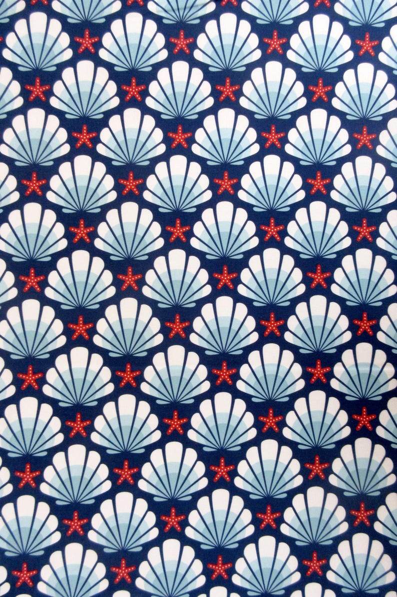 May include: A seamless pattern featuring white seashells with blue and white stripes on a navy blue background. Red five-pointed stars are scattered throughout the pattern.
