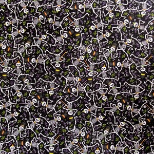 May include: A black background is covered with a repeating pattern of white skeletons in various poses. The skeletons wear top hats and hold drumsticks. Green and purple musical notes and confetti are scattered throughout the design.