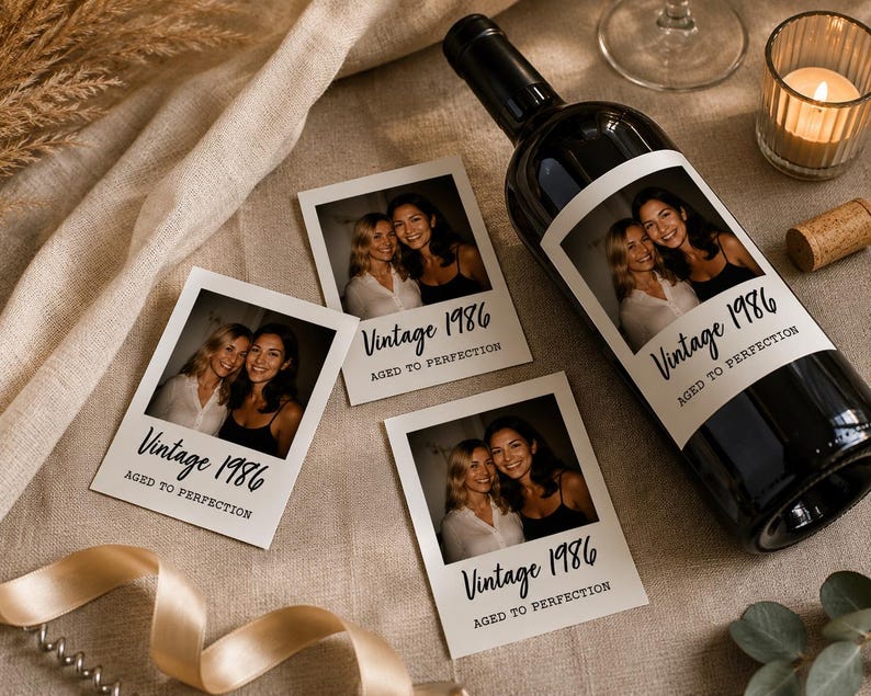 May include: A dark glass wine bottle and three square photo prints featuring two smiling individuals. Each print and the bottle label display the text Vintage 1986 and Aged to Perfection in a black script and serif font combination.