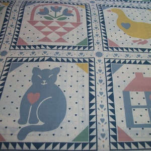 May include: A patterned fabric featuring repeating squares with various illustrations. Each square contains a different design, including a cat, a house, a goose, and a basket of flowers. The fabric has a white background with blue, pink, yellow, and green accents.