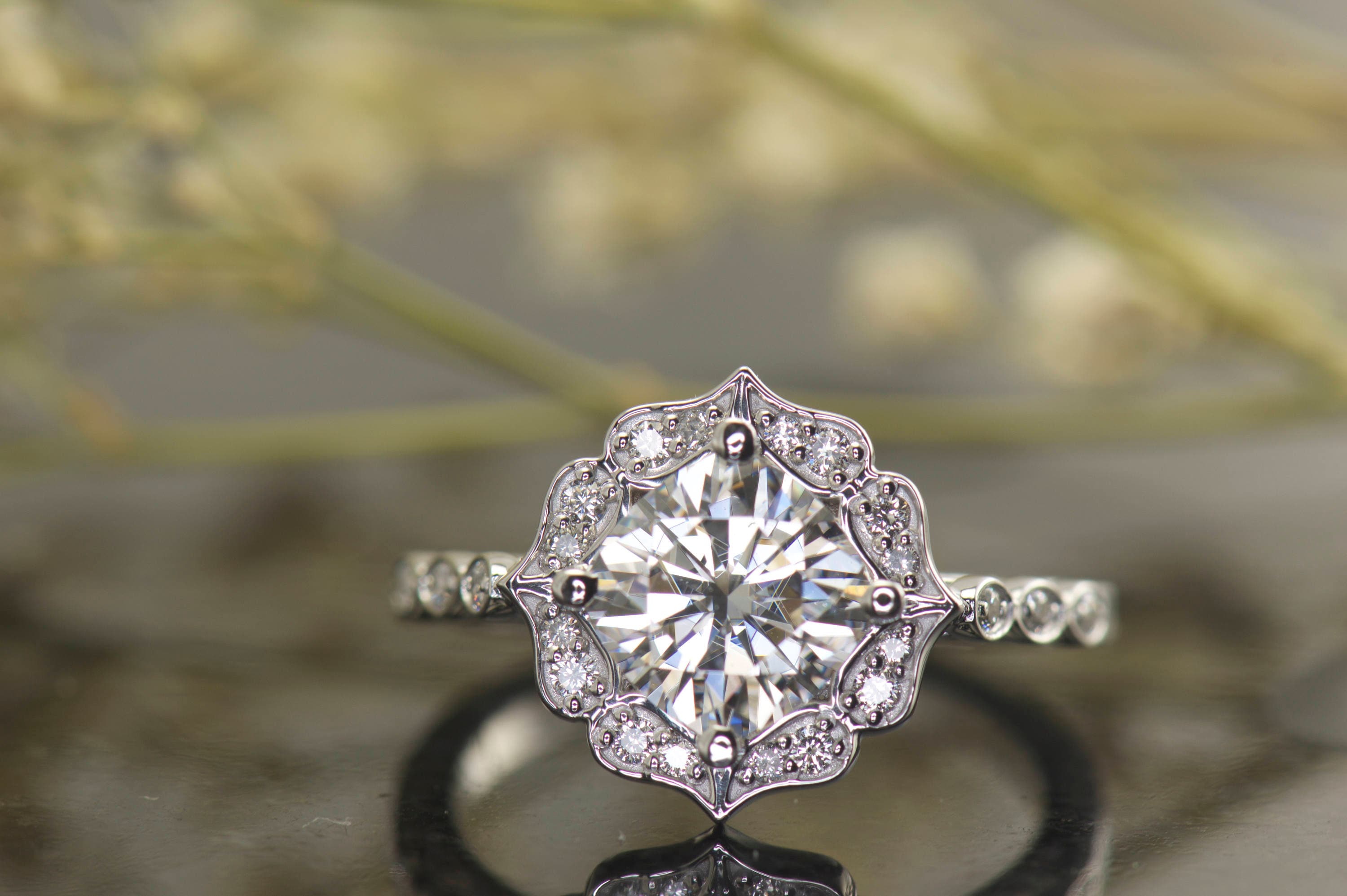 Kite Set Cushion Cut Moissanite and Scalloped Diamond Halo
