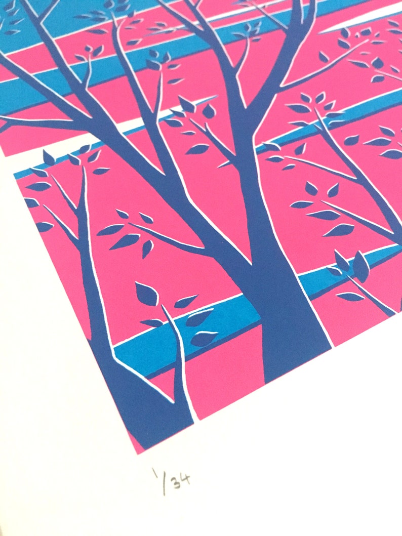 May include: A print featuring a stylized illustration of trees with blue branches and leaves against a pink and blue striped background. The print is numbered 1/34 in the lower right corner.