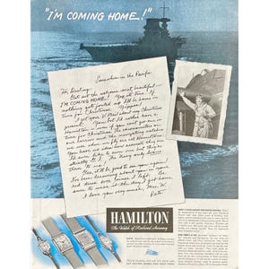 May include: A vintage advertisement for Hamilton watches featuring a handwritten letter from a soldier stationed in the Pacific. The letter reads "I'm coming home!" and mentions the importance of Hamilton chronometers and navigating watches for the Navy. The ad also features a photo of the soldier in his uniform, standing on a ship's deck. The ad text highlights the accuracy and reliability of Hamilton watches, emphasizing their use by the Navy.