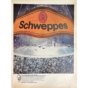 May include: A close-up of a glass bottle of Schweppes tonic water. The bottle is covered in condensation and the Schweppes label is visible on the front. The text on the label reads "Schweppes". The text below the image reads "The twelfth bubble from the left is an excellent example of Schweppervescence. So is the one almost dead center. They're all rather good, actually. From the top of the bottle to the bottom. From first sip to last. Set a good example. Serve Schweppes Tonic. Unique taste. Curiously refreshing. In one way bottles, naturally. Schweppes - a lively English tradition."