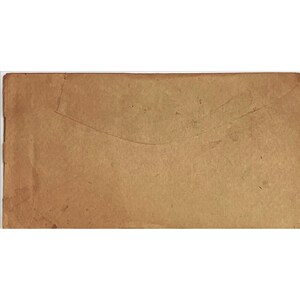 May include: A plain brown paper envelope with a slight bend in the upper left corner.