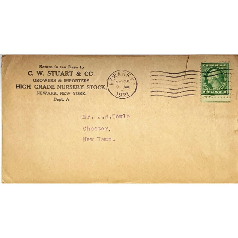 May include: A vintage envelope addressed to Mr. J.W. Towle in Chester, New Hampshire. The envelope is postmarked May 26, 1921, and has a 1-cent postage stamp featuring a profile of George Washington. The return address is for C.W. Stuart & Co., Growers & Importers, High Grade Nursery Stock, Newark, New York, Dept. A.