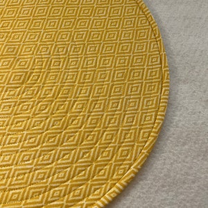 Maize yellow geometric patterned Round, Quilted Placemats