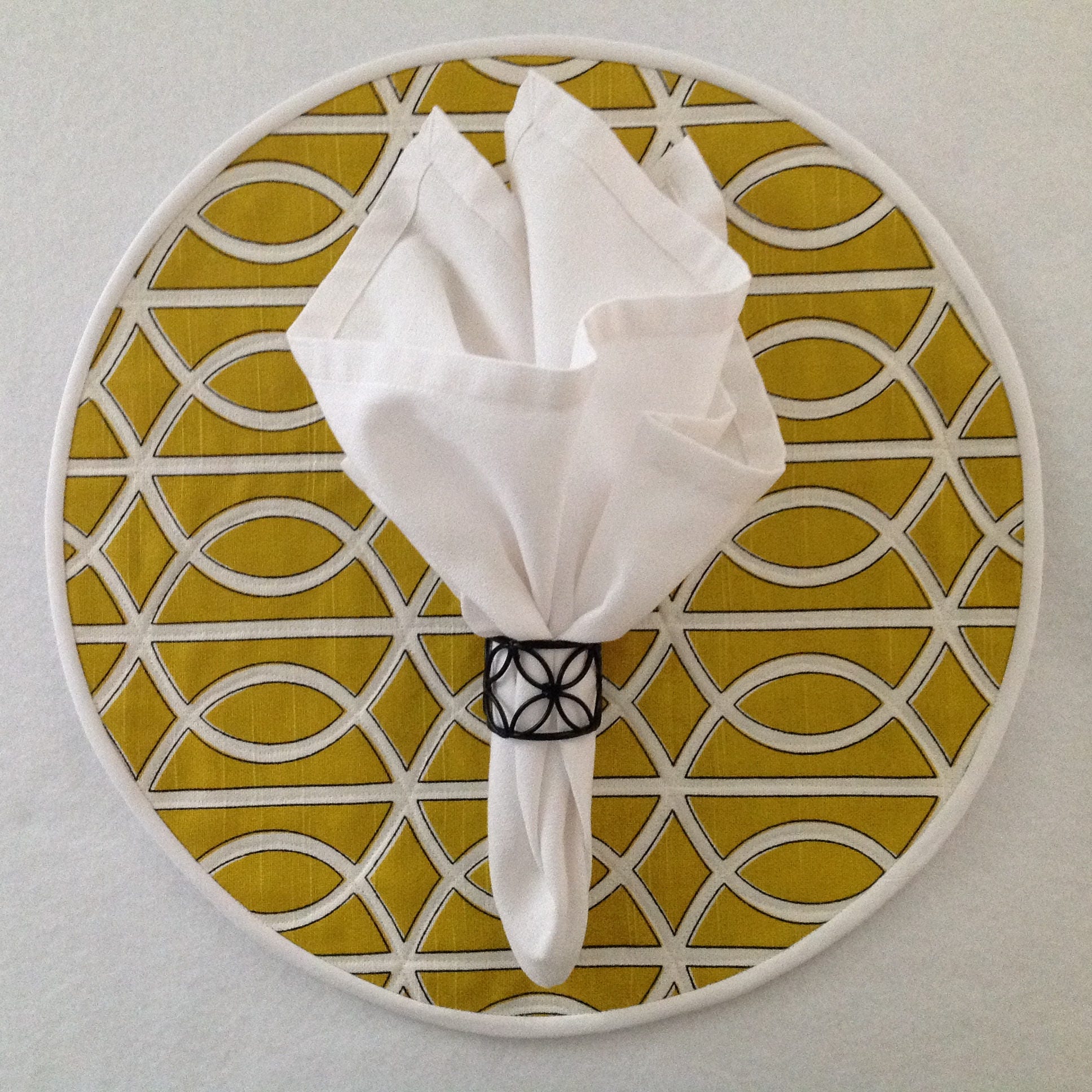 Bold Mustard yellow quilted geometric round placemats.