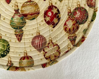 Rich Traditional Christmas Ornaments on a Cream Colored Background. Quilted Round Placemats. Sold in Sets of 2