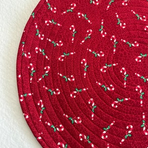 Christmas Candy Canes on Red Quilted Round Placemats