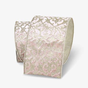 May include: A roll of decorative ribbon with a pink velvet texture and a gold glitter damask pattern. The ribbon has a cream-colored backing and is suitable for crafts, gift wrapping, and holiday decorations.