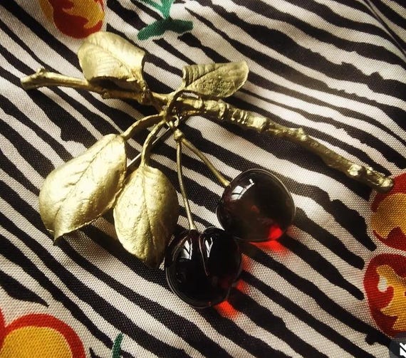 Michael Michaud designer vintage glass brooch swinging morello cherries on gold branch with leaves (cast in bronze) for the V&A