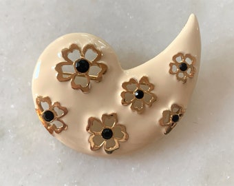 CRAFT Antique White Enamel Paisley Brooch with Gold Tone Flower Cut outs - Hand Set with Faceted Black Stones - Made in USA