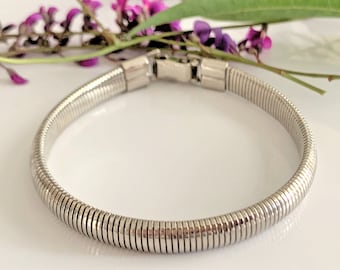 Vintage Tubogas Domed Narrow Stretch 7 1/2” Bracelet in Silver Tone with Fold Over Clasp - Made in USA