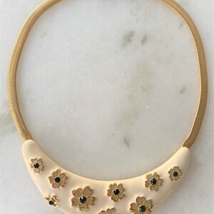 CRAFT Antique White Enamel Crescent Necklace w Gold Tone Daisy Cut Outs Hand Set Black Faceted Stones - Gold Tone Mesh Chain - Made in USA