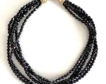 1980's Black Faceted Glass 5 Strand 19" Hand Strung Necklace with Gold Lobster Clasp