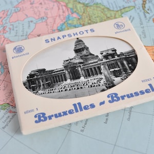 Souvenir postcard block of the city of Brussels in Belgium from the 50s