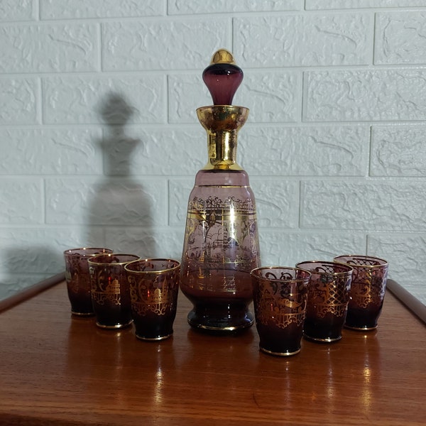 Vintage amethyst glass decanter and 6 shot glasses with applied gold tone gilt scenes of Venice Italy FREE UK shipping
