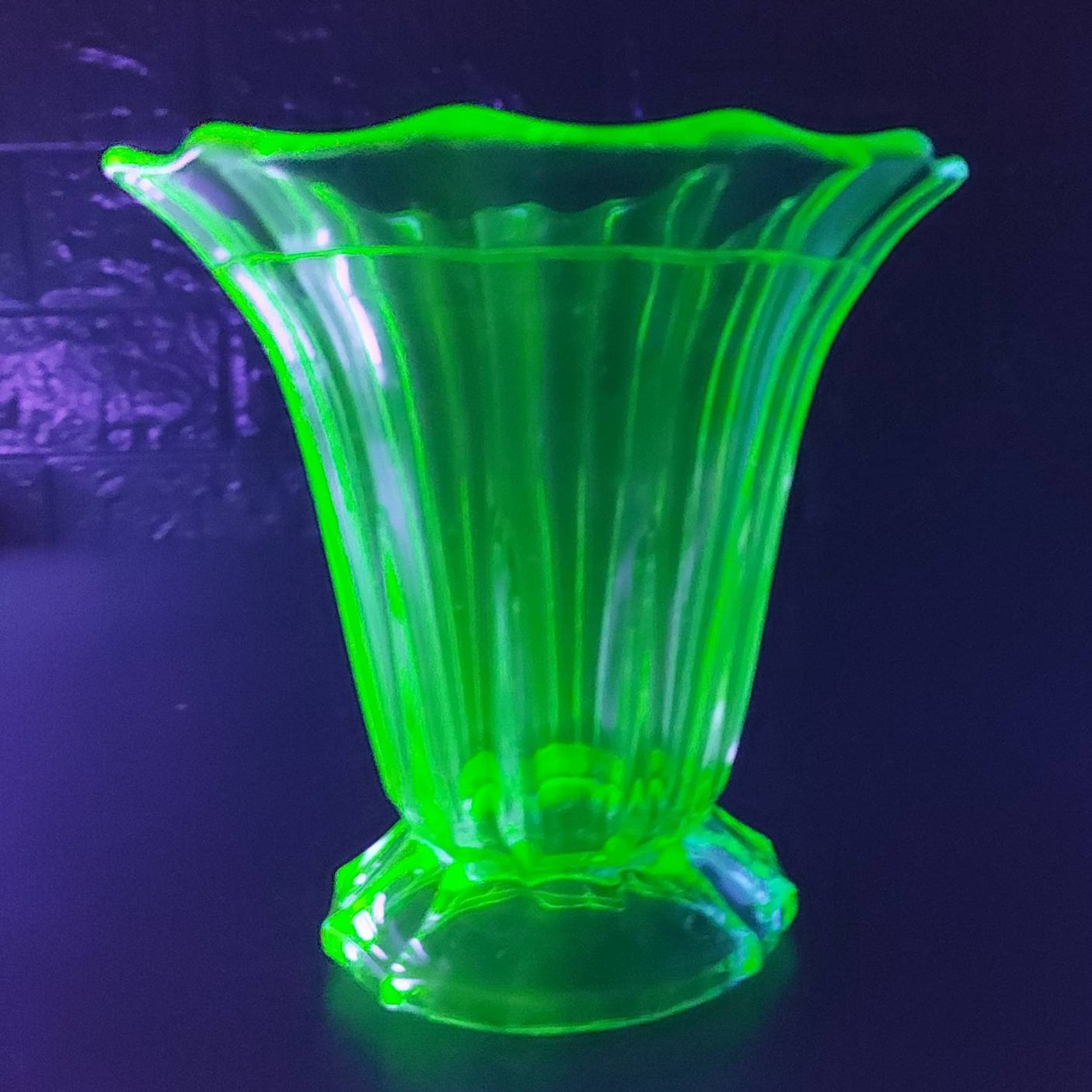 Uranium green glass footed vase with flared rim UV reactive Etsy