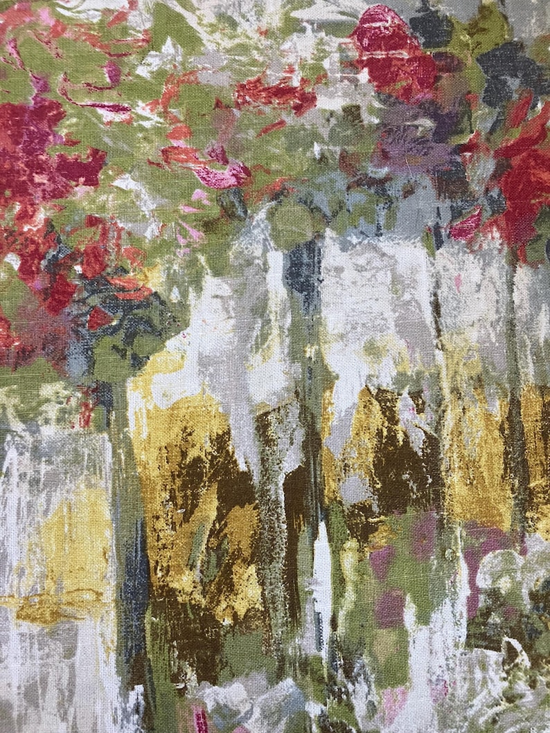 May include: Abstract floral pattern fabric with shades of red, pink, green, yellow, and brown. The fabric has a textured, linen-like appearance.