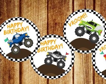 May include: Four printable monster truck themed birthday party favor stickers. The stickers feature a monster truck with the text "Happy Birthday!" and "Vroom!" in orange and black. The stickers are available in two sizes: 2 inches and 1.5 inches.