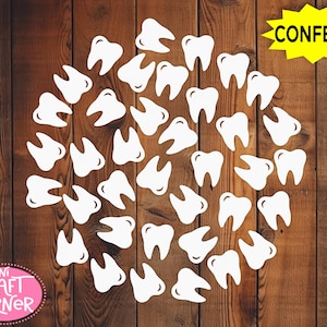 May include: White tooth-shaped confetti scattered on a wooden background. A yellow starburst with the word "CONFETTI" is in the upper right corner. The logo for "Mini Craft Corner" is in the lower left corner.