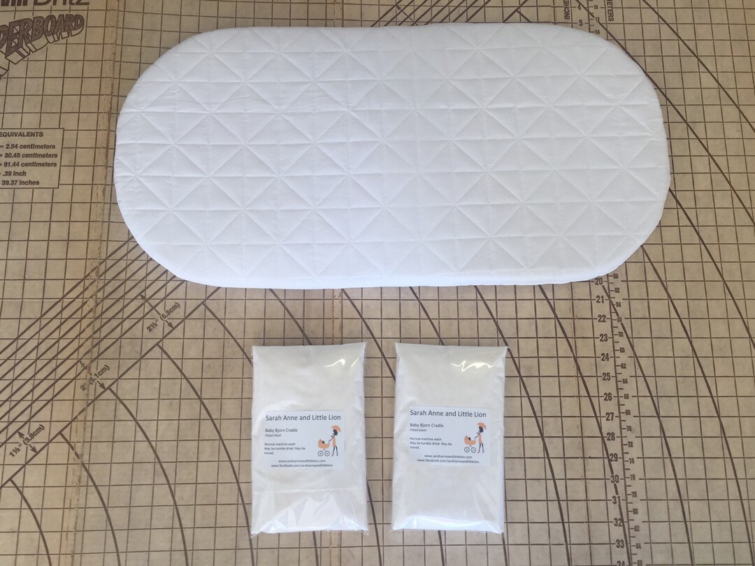 Baby Bjorn Quilted Waterproof Mattress Protector and 2 Fitted