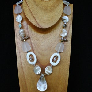 White shell necklace--mother of pearl, natural shell, cut shell beads, seaglass, Swarovski crystals, pearls, gold filled lobster clasp.