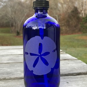 Cobalt blue glass Soap Dispenser with etched Sand Dollar