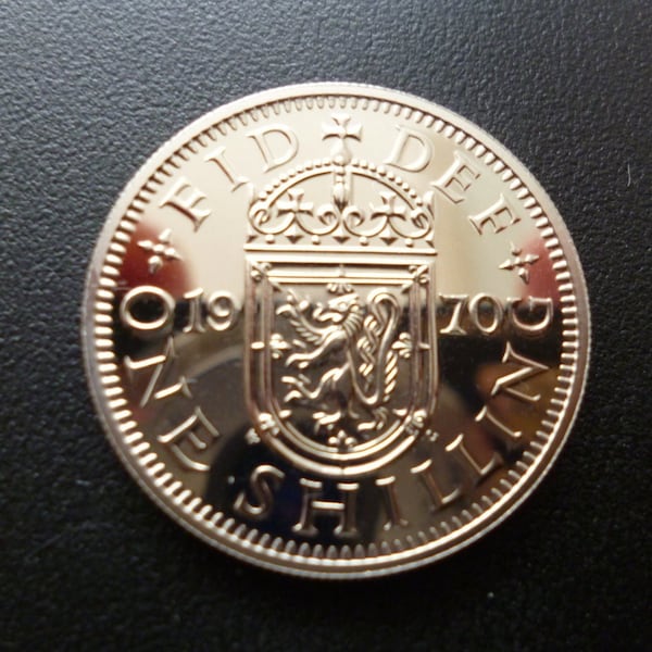 United Kingdom Proof 1970 Scottish One Shilling coin in superb condition housed in a capsule featuring the late Queen Elizabeth The Second.