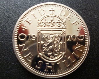 United Kingdom Proof 1970 Scottish One Shilling coin in superb condition housed in a capsule featuring the late Queen Elizabeth The Second.