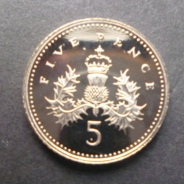 United Kingdom Royal Mint Year 2003 Proof Five Pence Coin housed in a new capsule and in flawless proof condition.